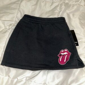 The Rolling Stones Charcoal Skort with Vibrant Pink Logo